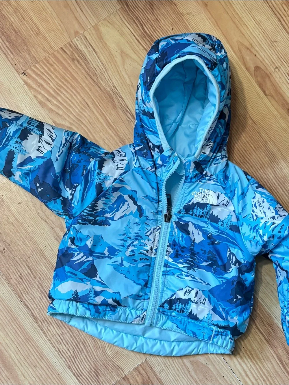 The North Face. Baby coat.  Reversible blue